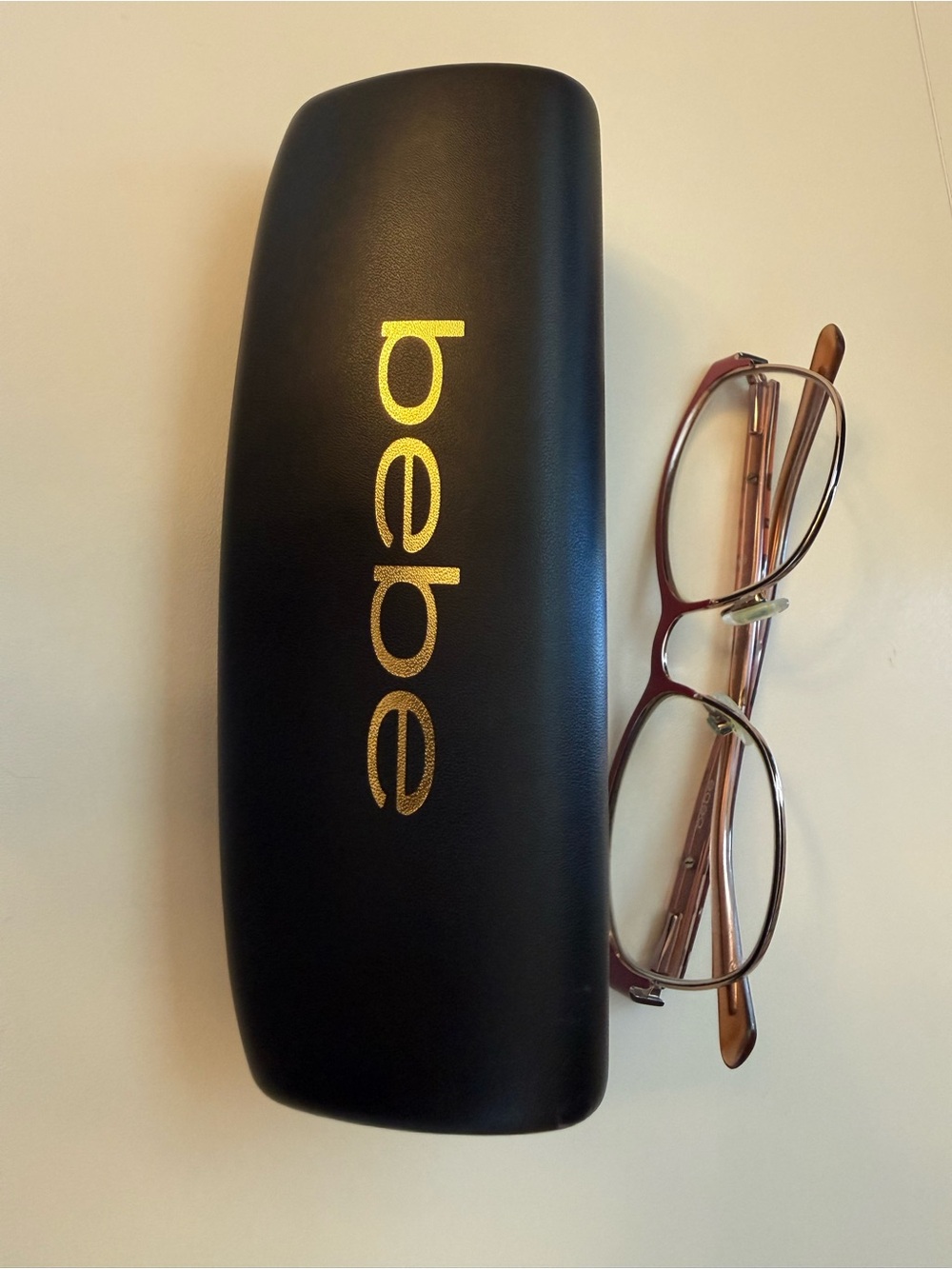 bebe Black Eyewear Case with Gold Logo and pink frame bejeweled